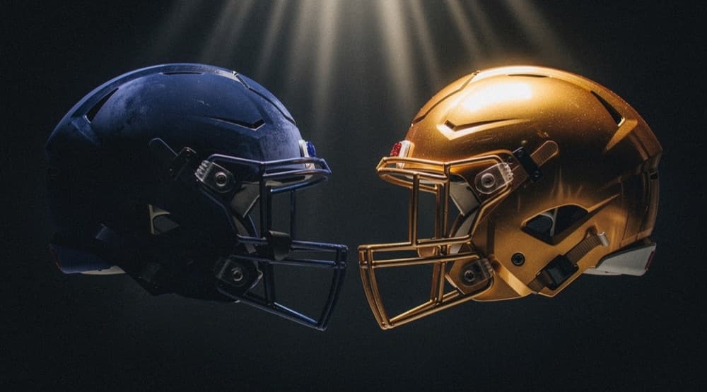 Blank navy and gold helmets facing off before kickoff